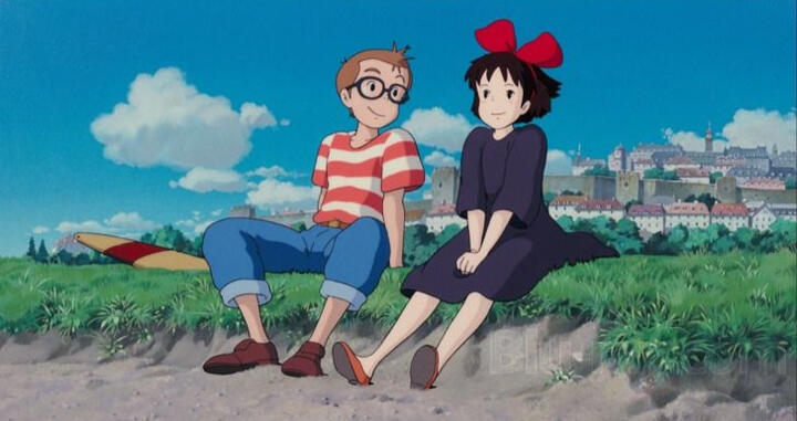 Kiki's Delivery Service screencap. Tombo and Kiki sitting next to each other on a small ledge.